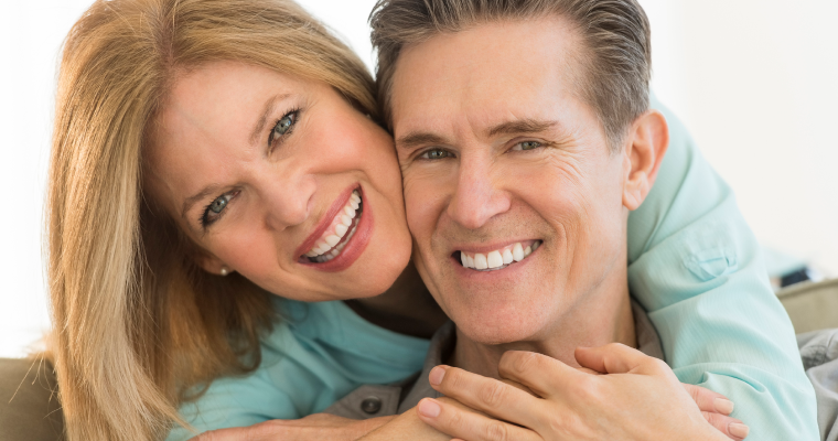 couple-smiling-and-embracing