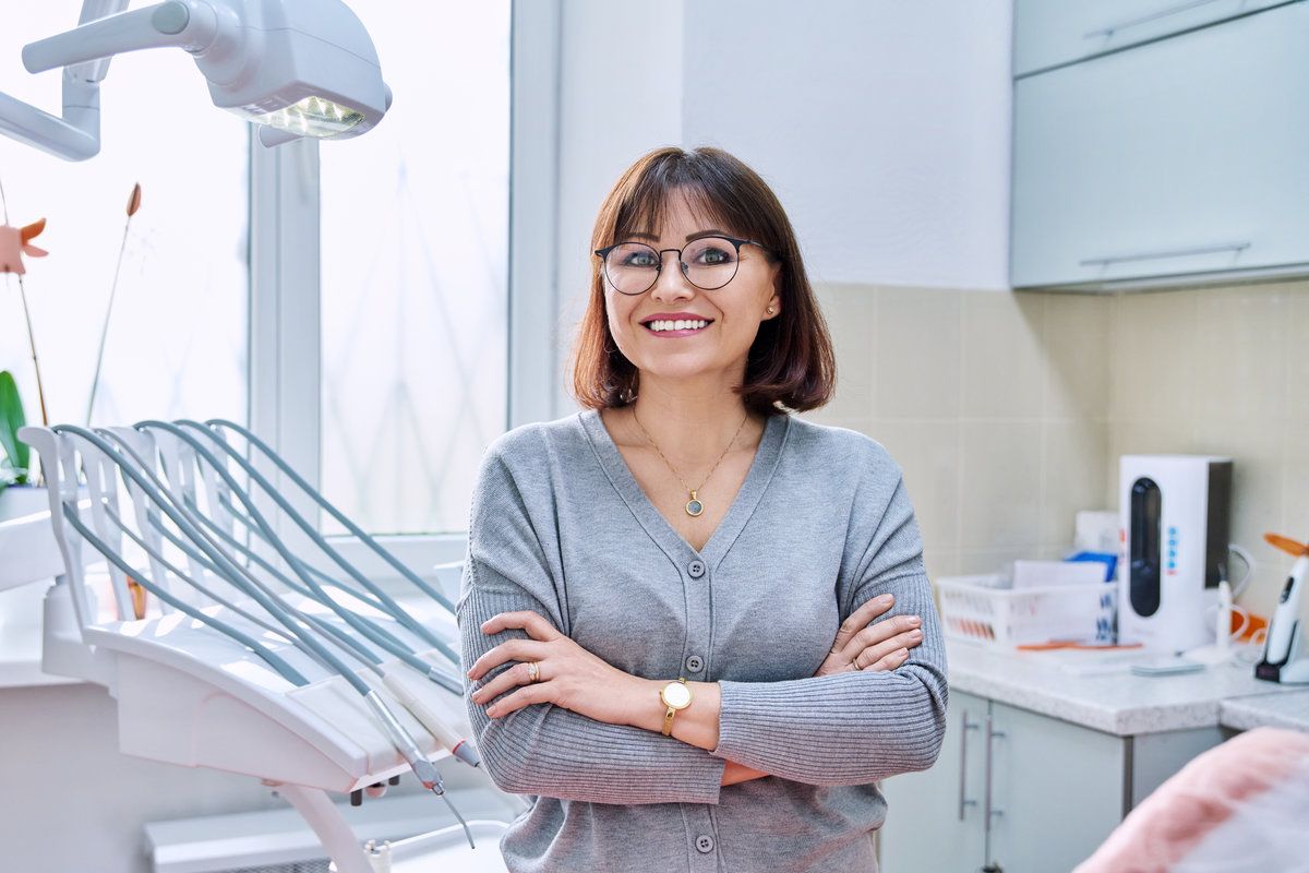 Smiling mature woman in dental clinic
